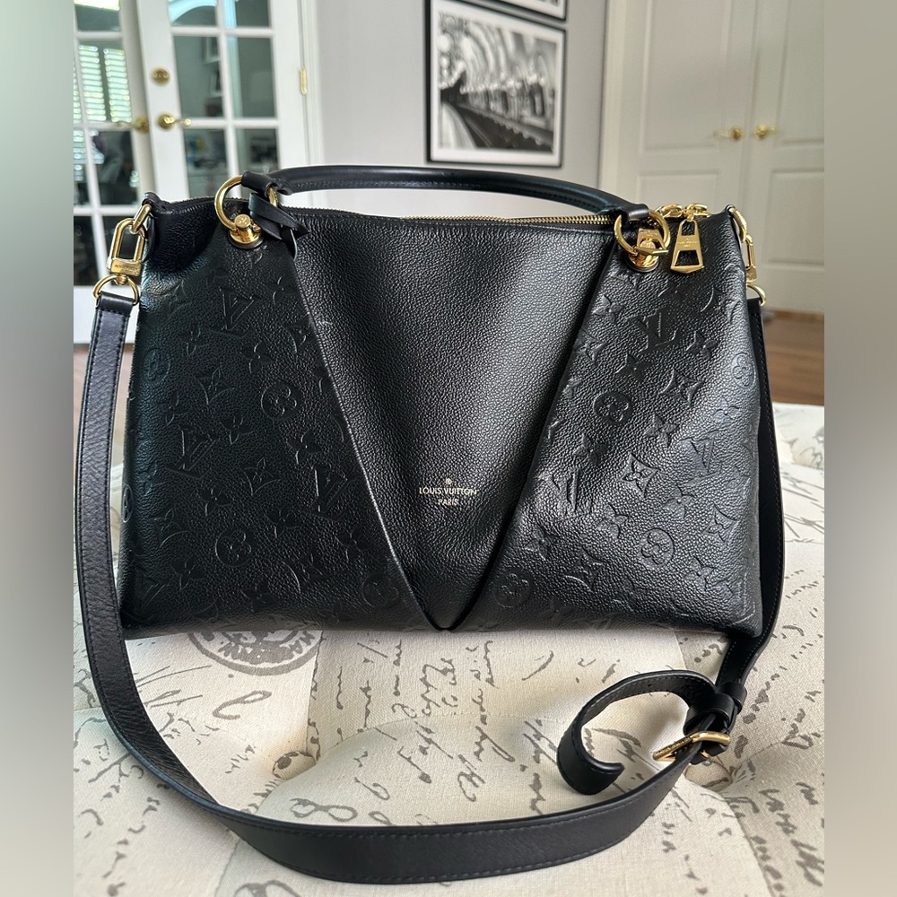 Authentic Louis Vuitton V Tote MM, good condition.